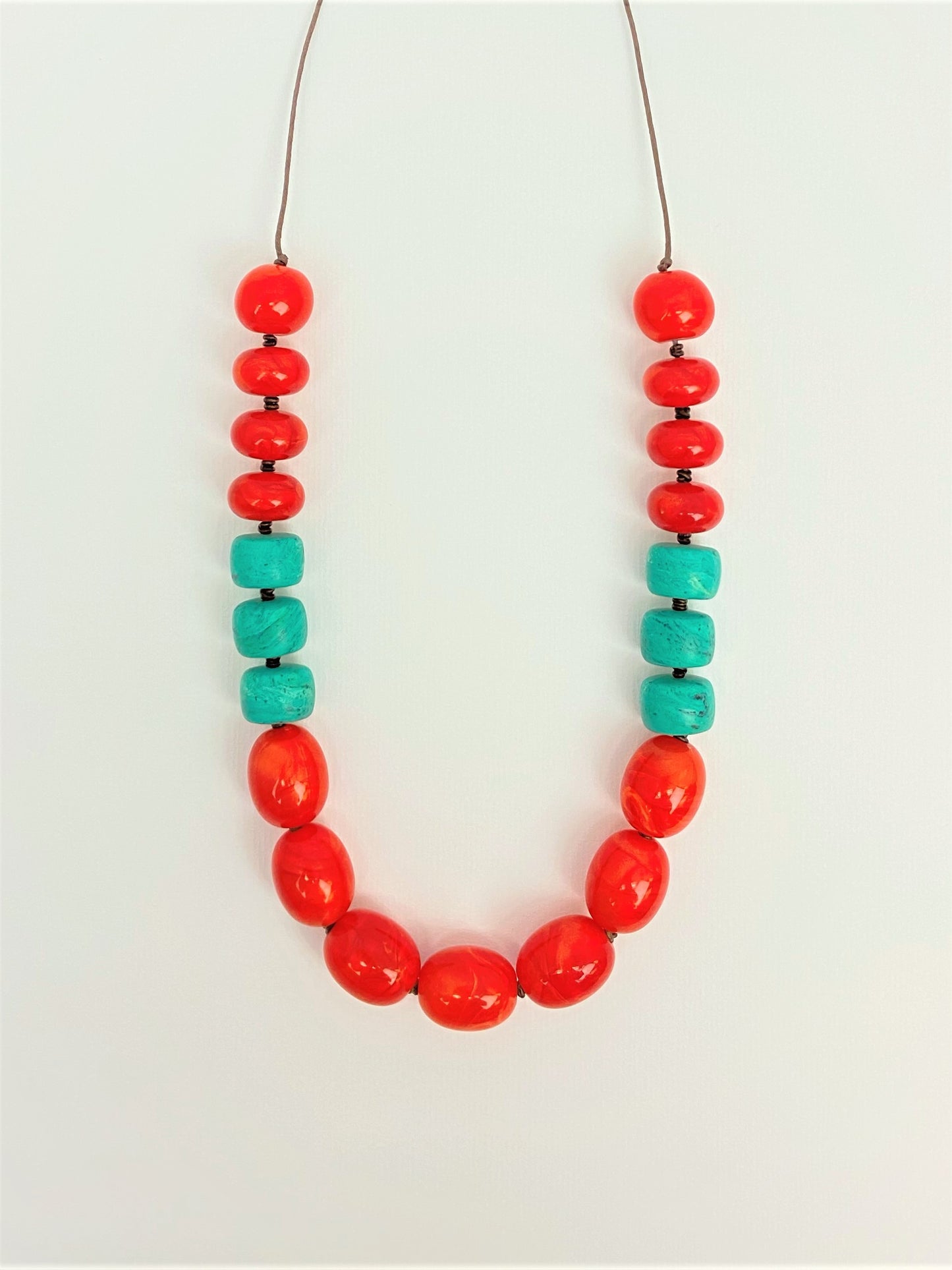 Flaming Teal Bead Necklace by Stage Jewellery with lantern melon beads