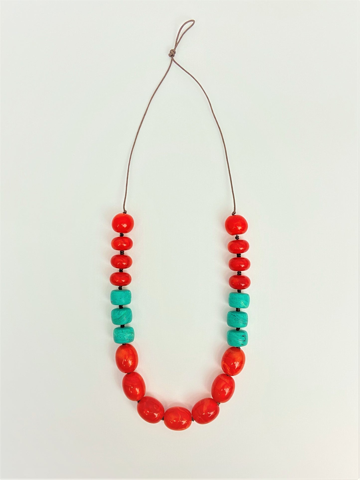 Flaming Teal Bead Necklace by Stage Jewellery with lantern melon beads