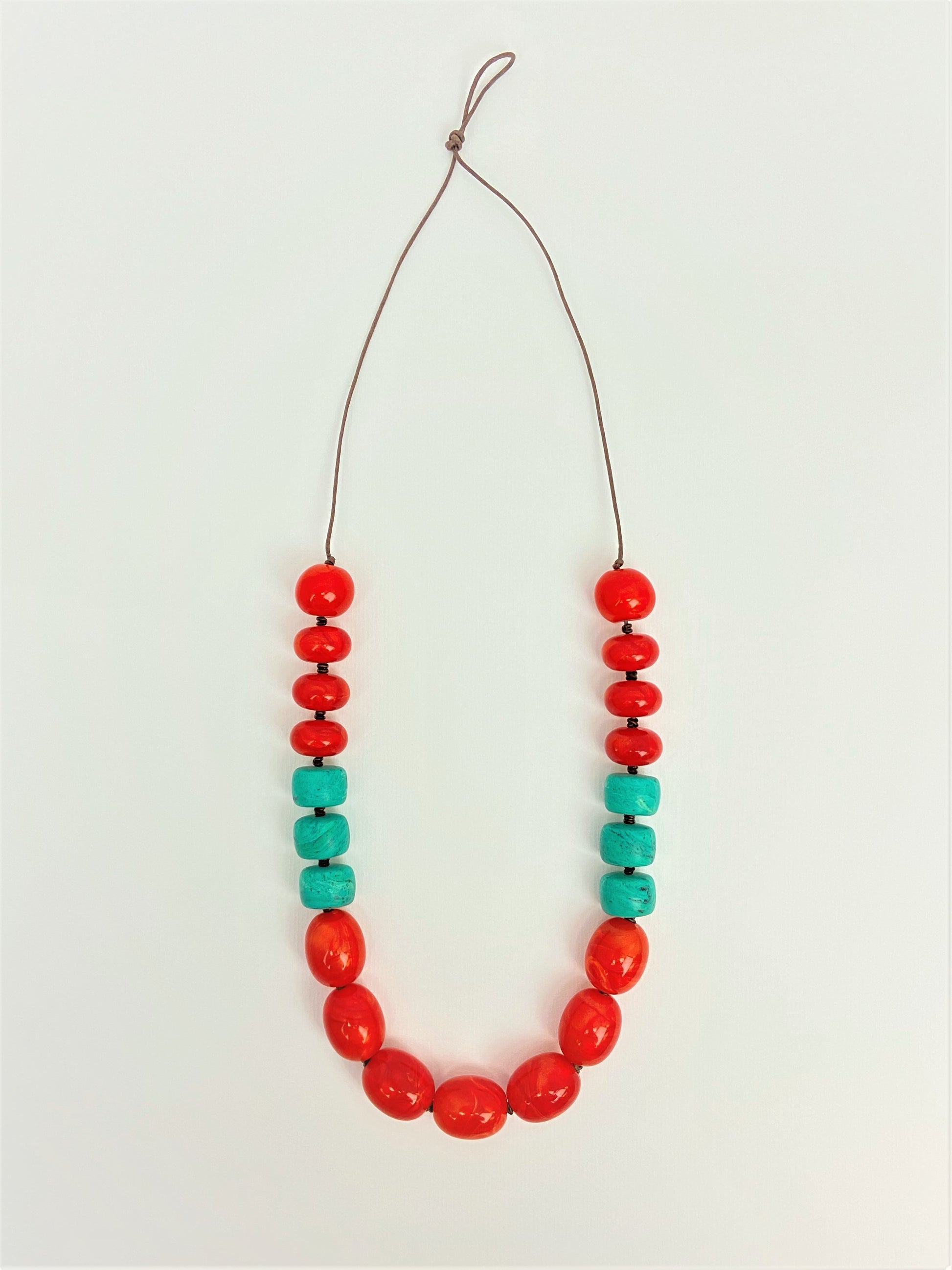 Flaming Teal Bead Necklace by Stage Jewellery with lantern melon beads