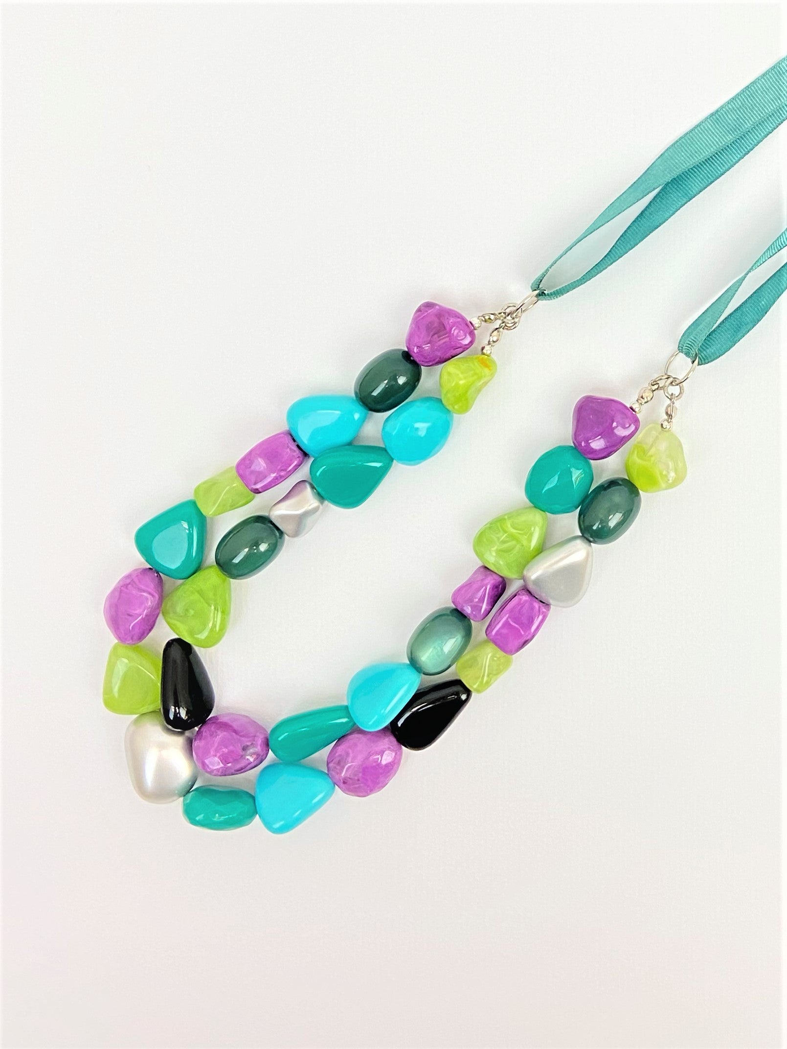 Teal Ale Mixed Bead Necklace by Stage Jewellery with multicolour beads and cyan teal ribbon strap