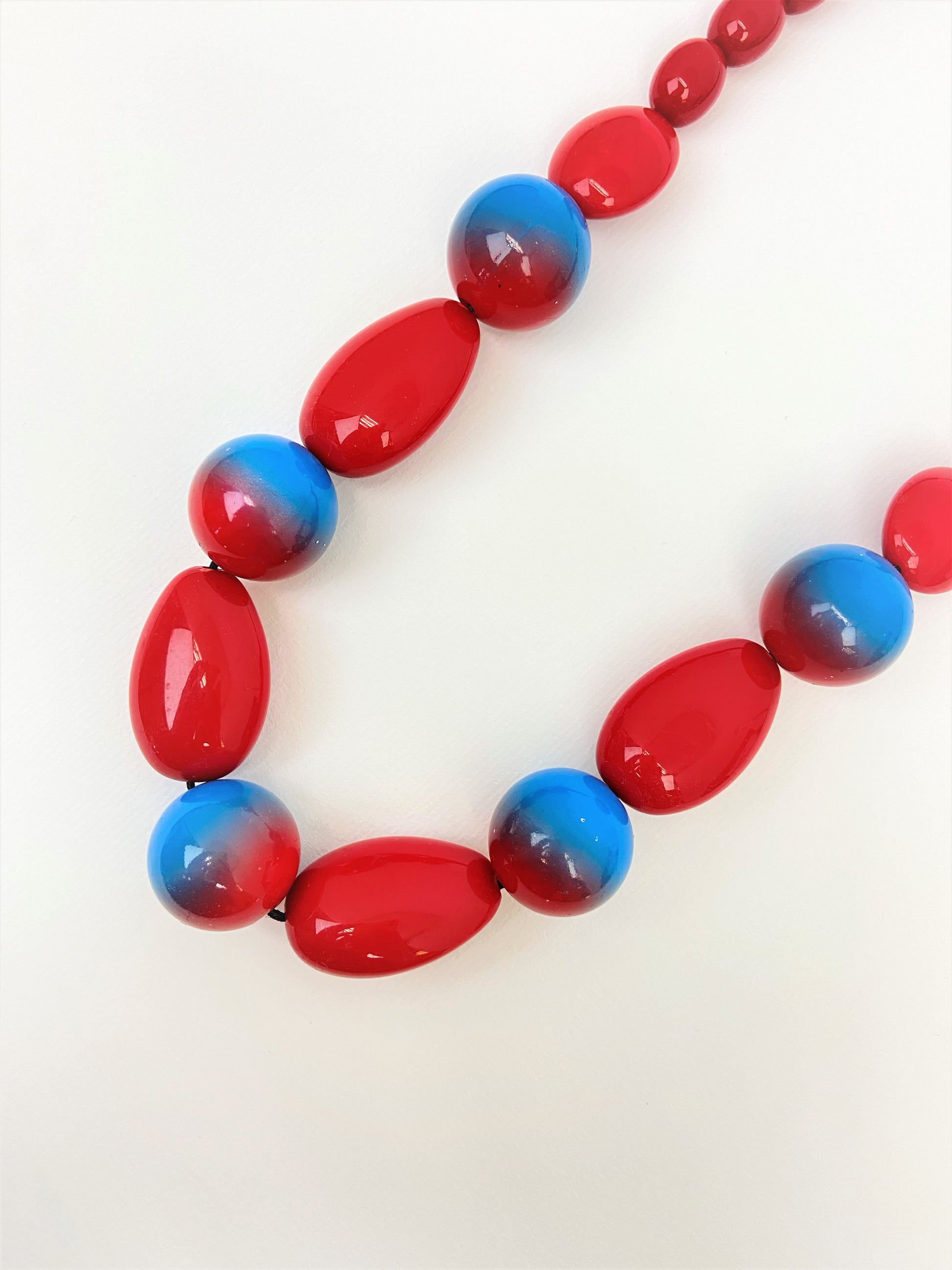 Ocean Flame Mixed Bead Necklace by Stage Jewellery with red blue tones in bold fashion style