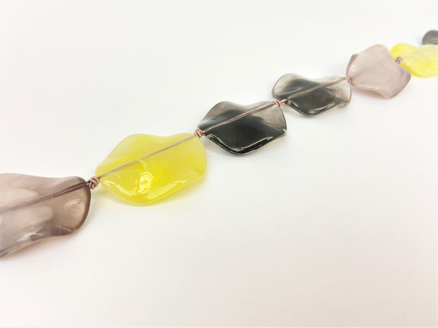 Lemon Dusk Petal Bead Necklace by Stage Jewellery in yellow and grey tones