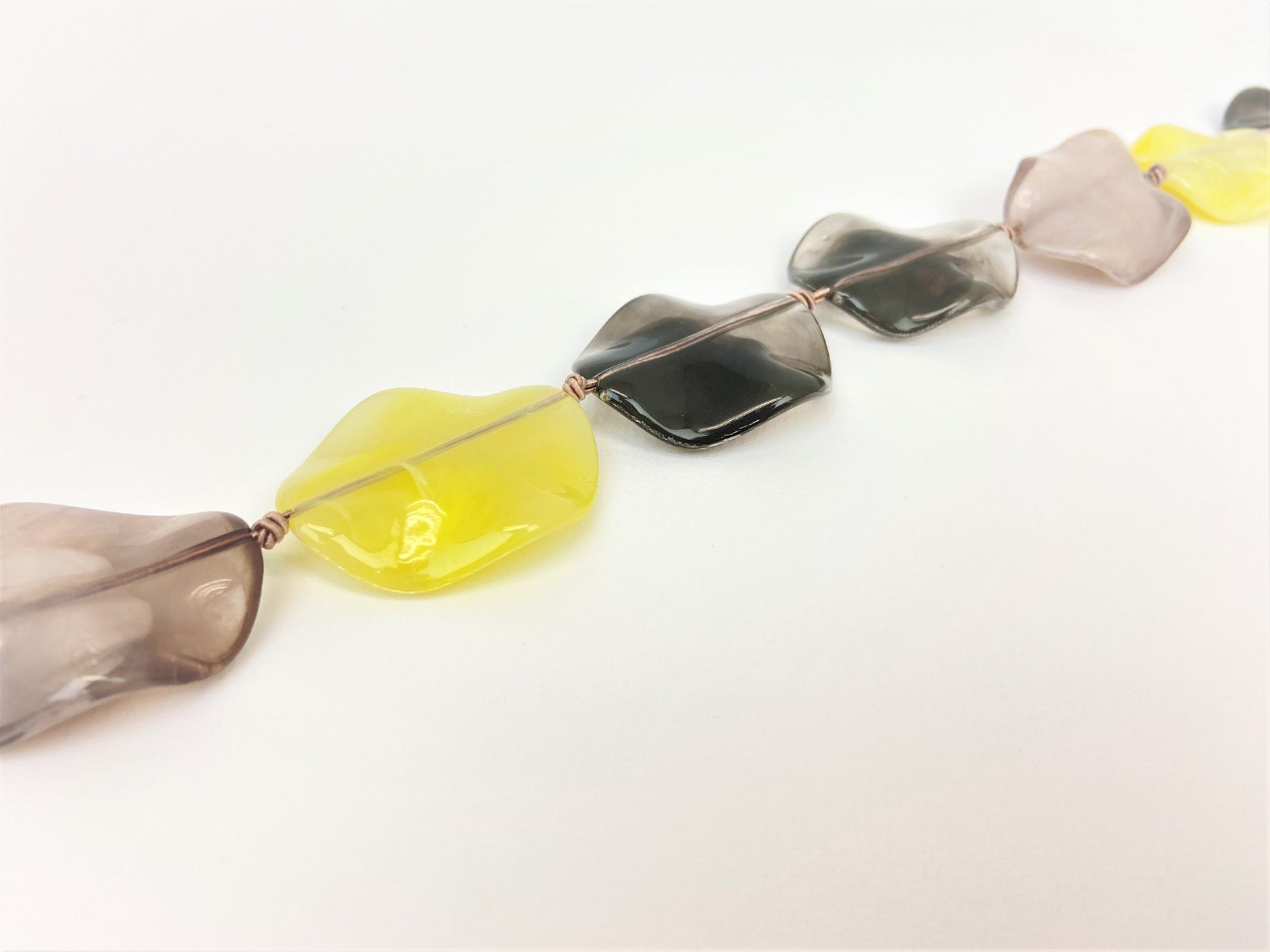 Lemon Dusk Petal Bead Necklace by Stage Jewellery in yellow and grey tones
