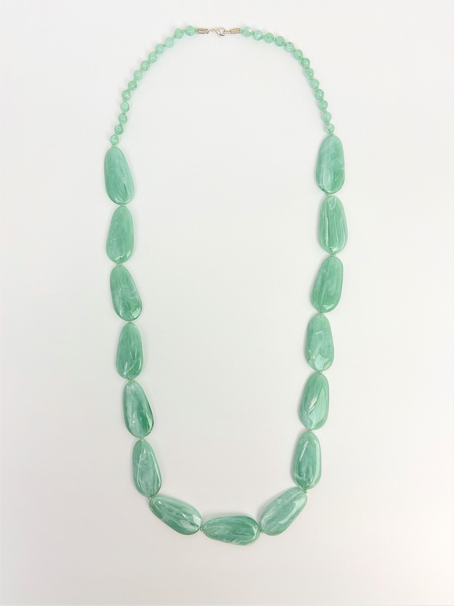 Riverside Pebble Necklace by Stage Jewellery with green tones