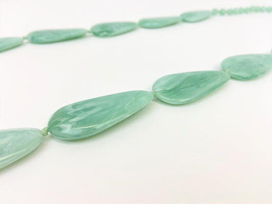 Riverside Pebble Necklace by Stage Jewellery with green tones