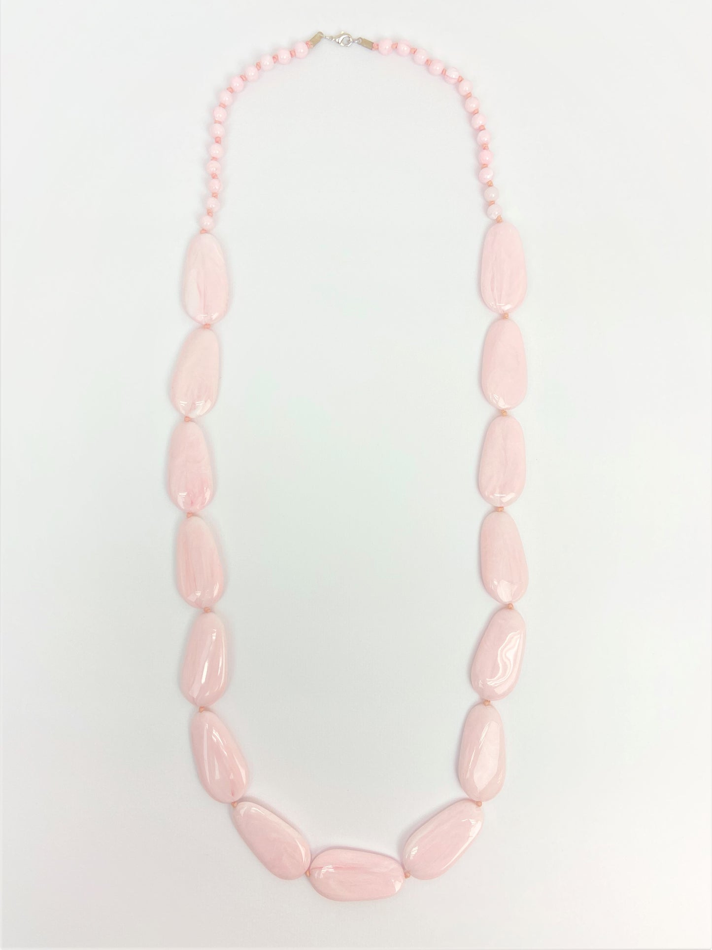 Bellerose Pebble Necklace by Stage Jewellery in calm rosy pink tone and fashion