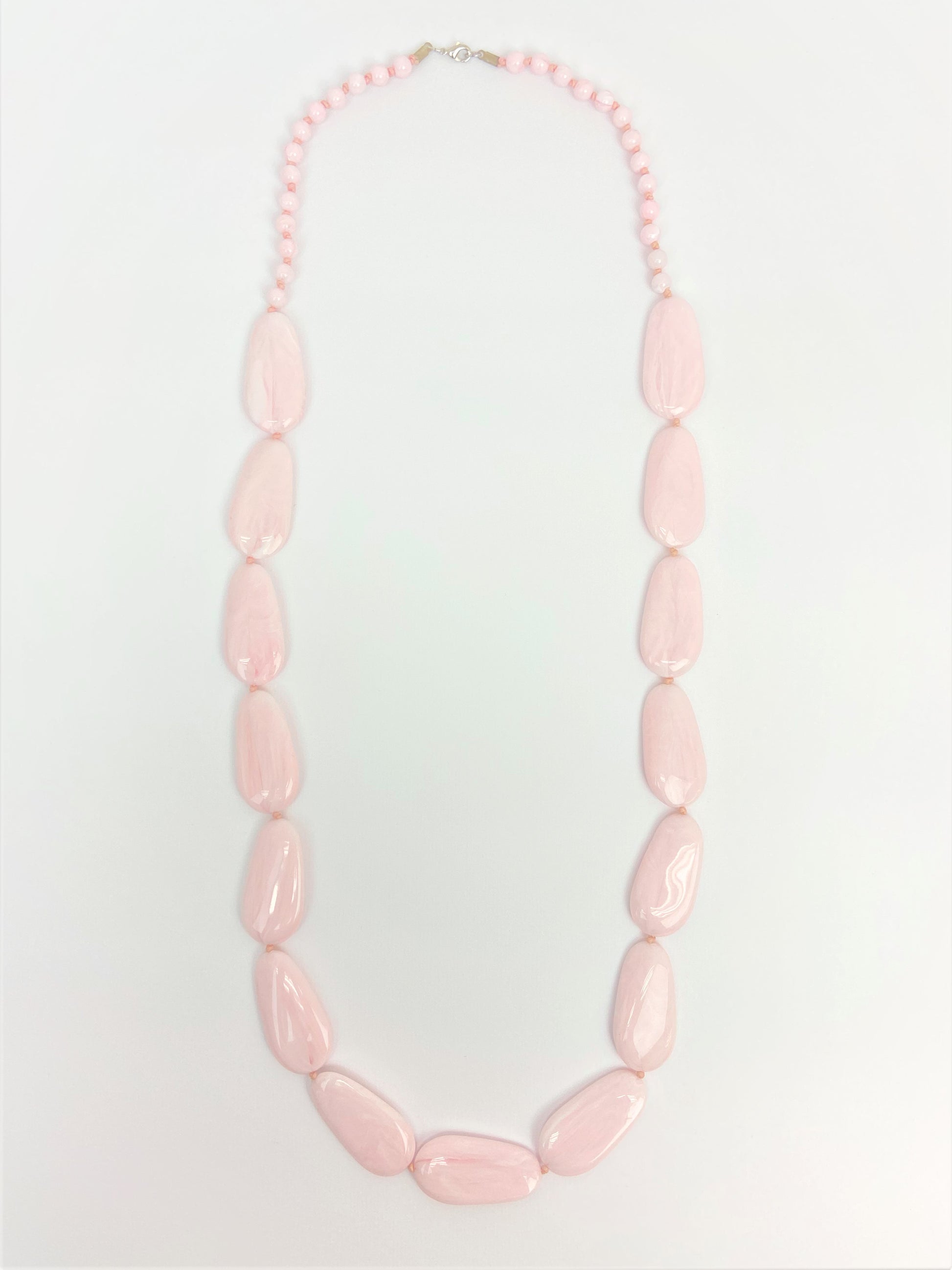 Bellerose Pebble Necklace by Stage Jewellery in calm rosy pink tone and fashion