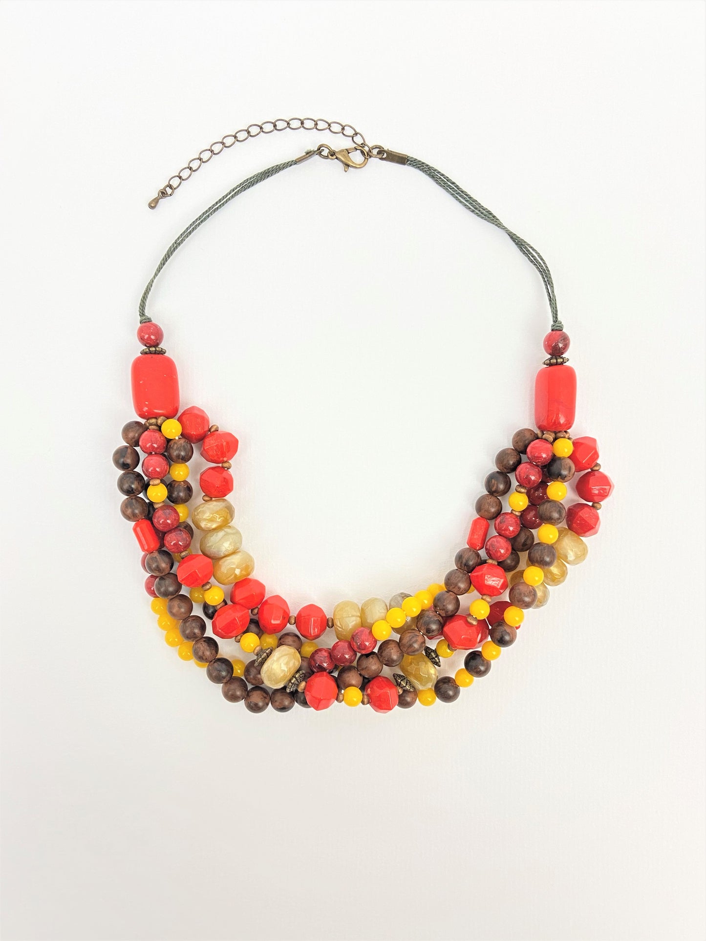 Glowing Lantern Mixed Bead Necklace by Stage Jewellery with red yellow brown beads