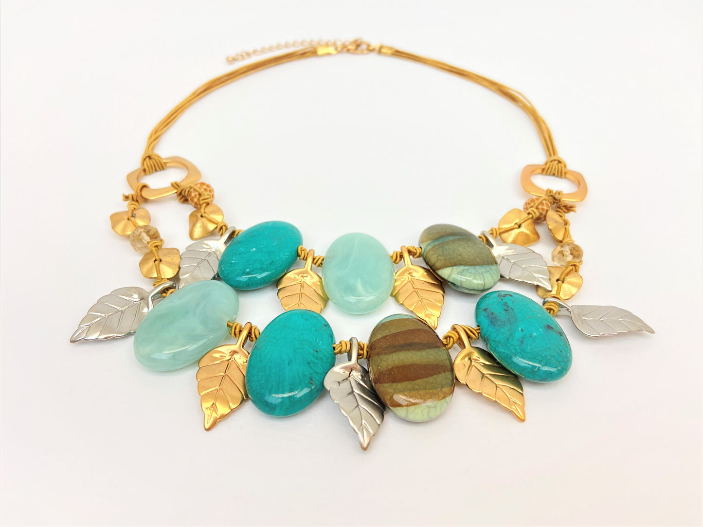 Dino Dream Mixed Bead Necklace by Stage Jewellery in cyan teal earth tones with gold and silver leaves