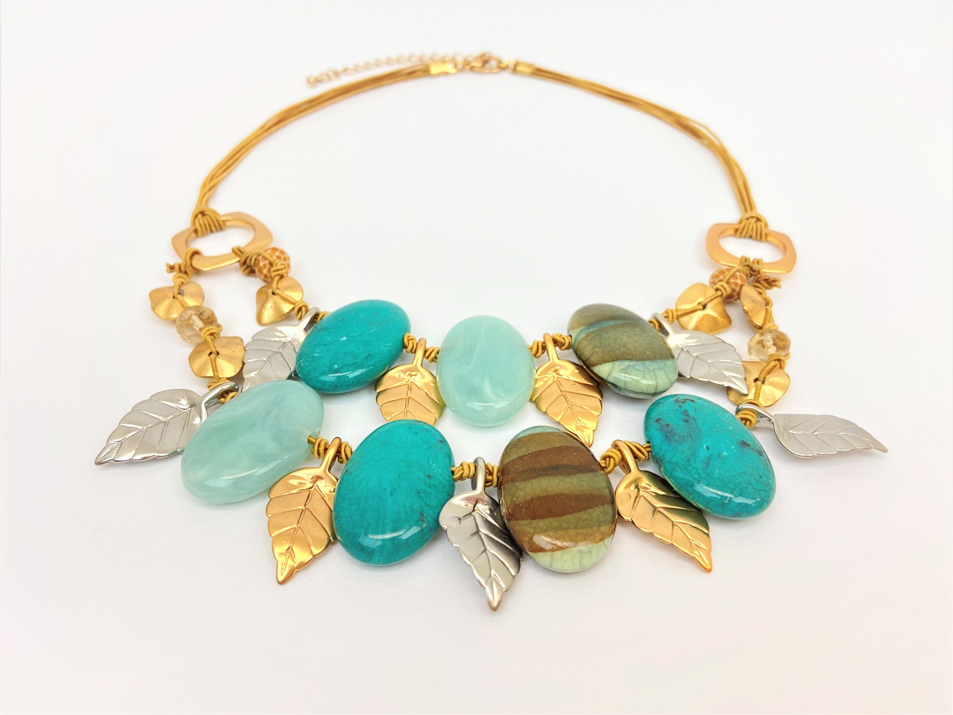 Dino Dream Mixed Bead Necklace by Stage Jewellery in cyan teal earth tones with gold and silver leaves