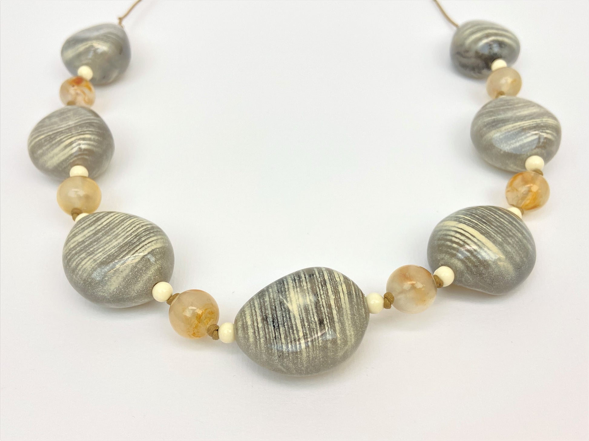 Baloo Dylan Mixed Bead Necklace by Stage Jewellery in neutral tones and retro fashion style