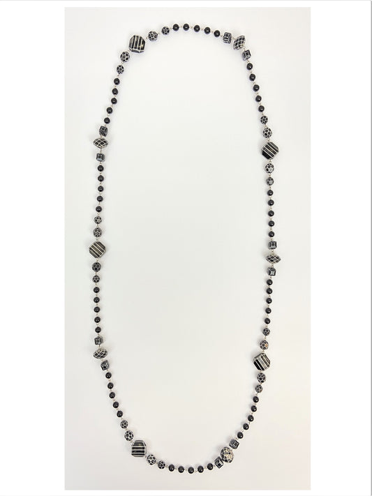 Millie Orca Mixed Bead Necklace by Stage Jewellery with black and white tones in vintage fashion style