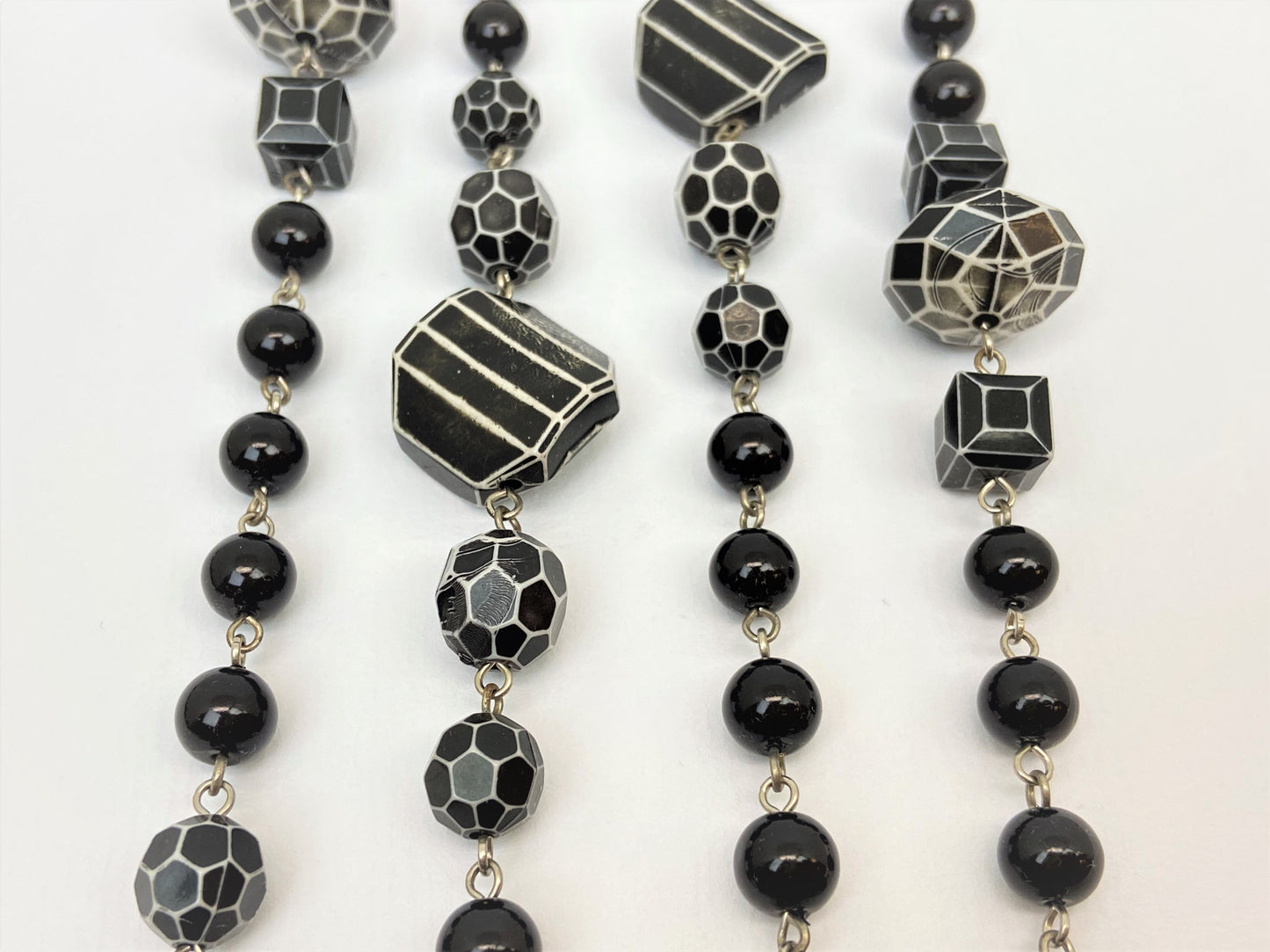 Millie Orca Mixed Bead Necklace by Stage Jewellery with black and white tones in vintage fashion style