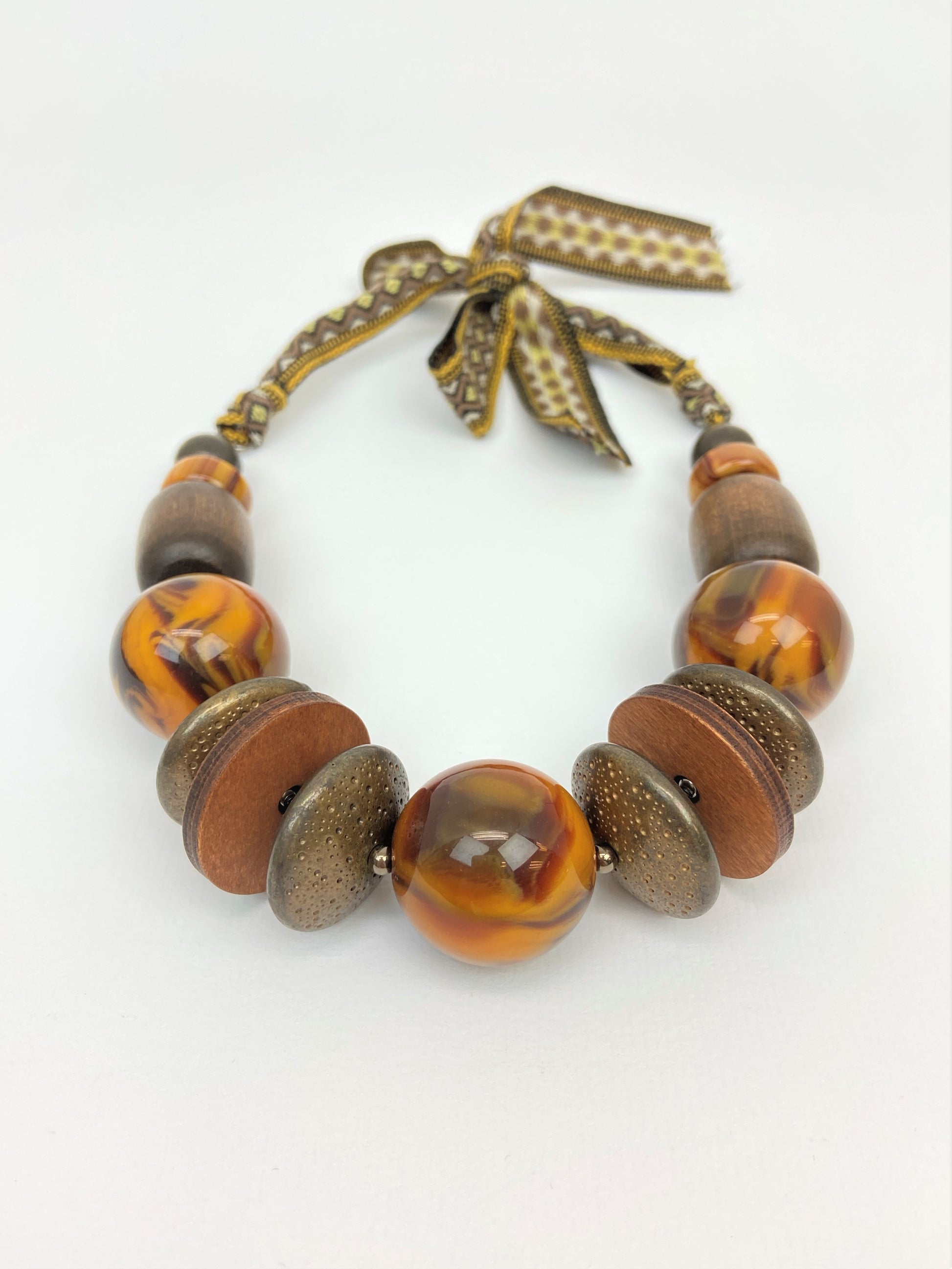 Ursa Lewin Mixed Bead Necklace by Stage Jewellery with brown tone beads and ribbon strap