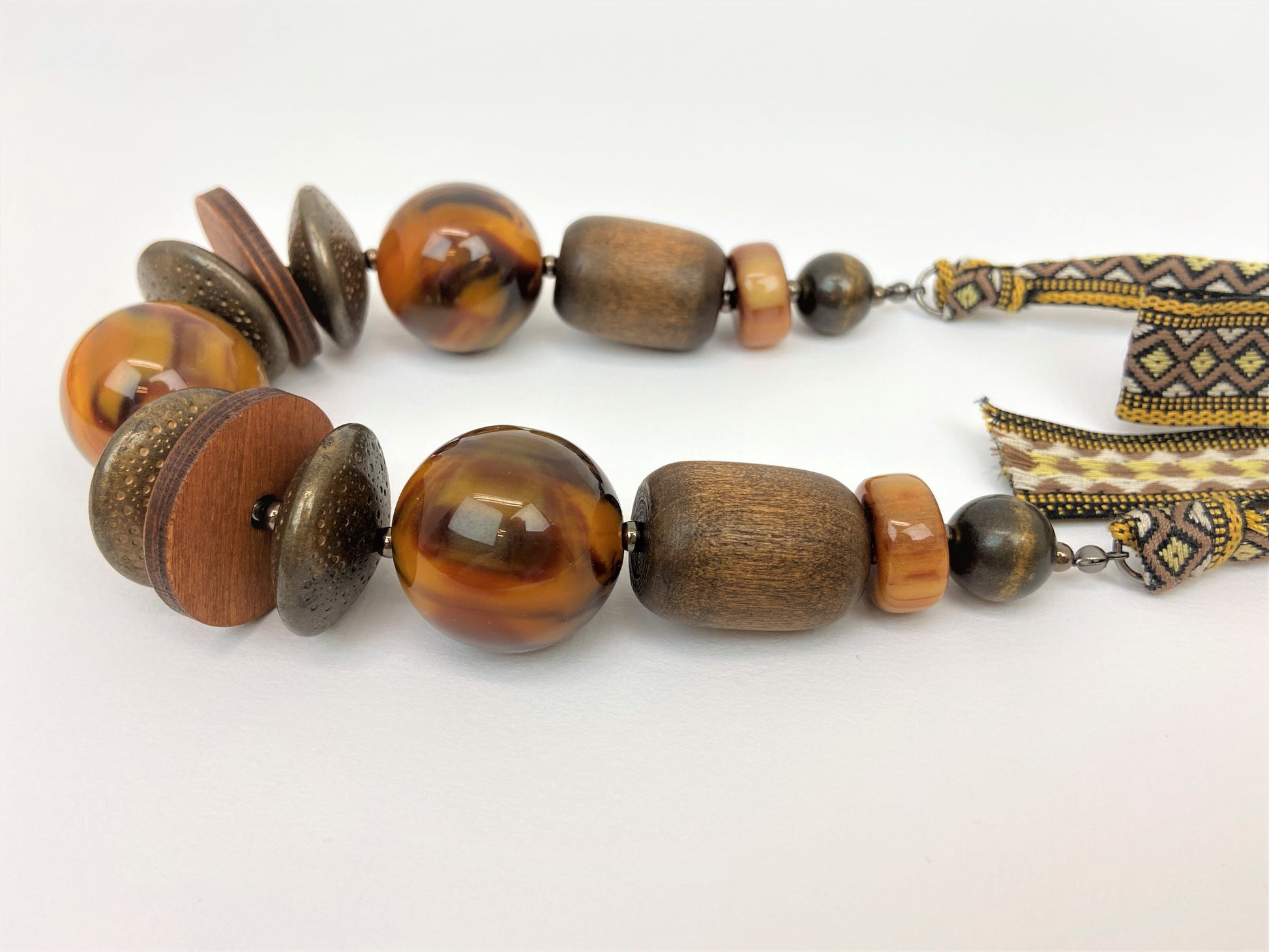 Ursa Lewin Mixed Bead Necklace by Stage Jewellery with brown tone beads and ribbon strap