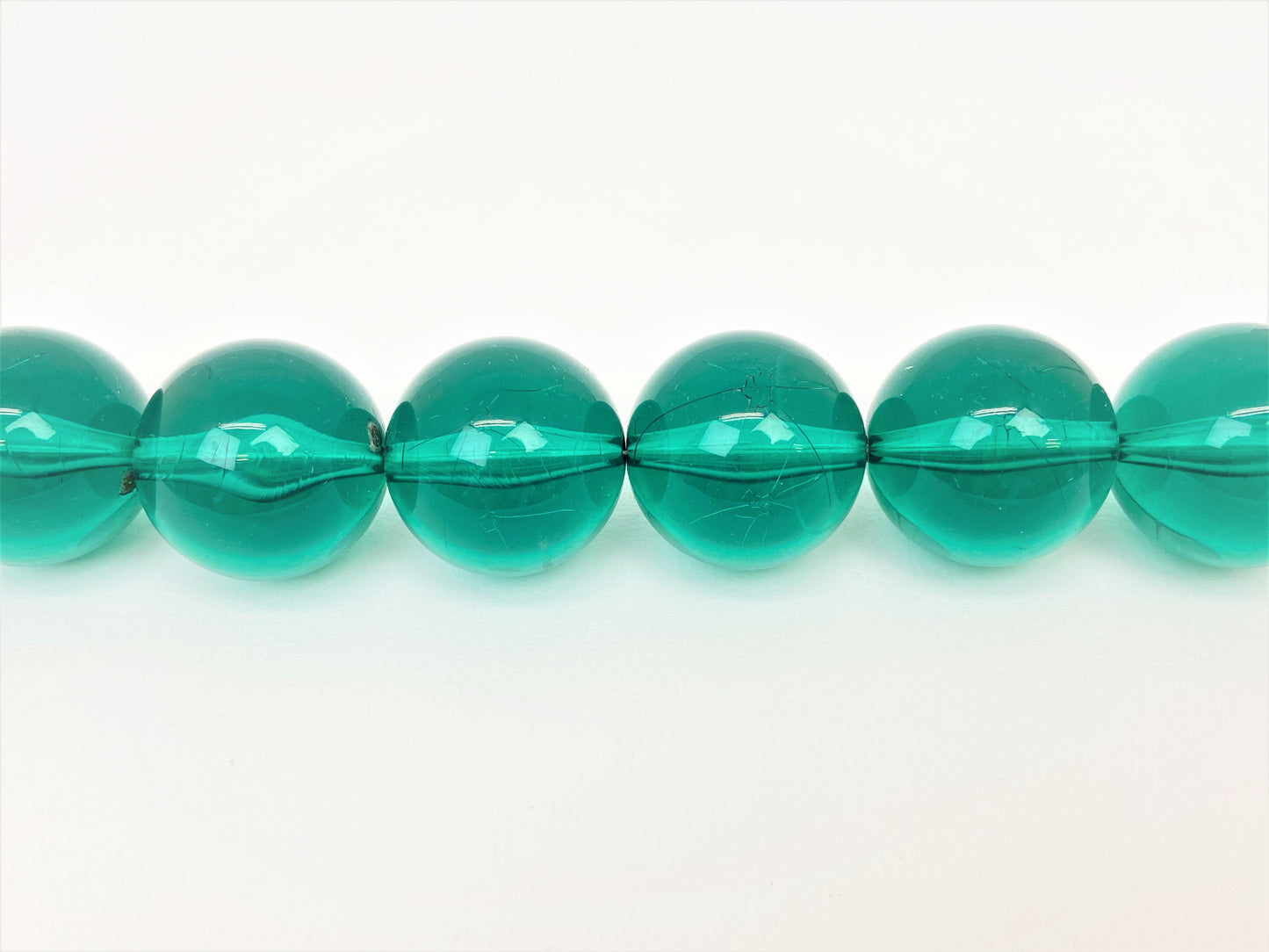 Vardon Enchantment Mixed Bead Necklace by Stage Jewellery with bold round transparent beads in green tones 