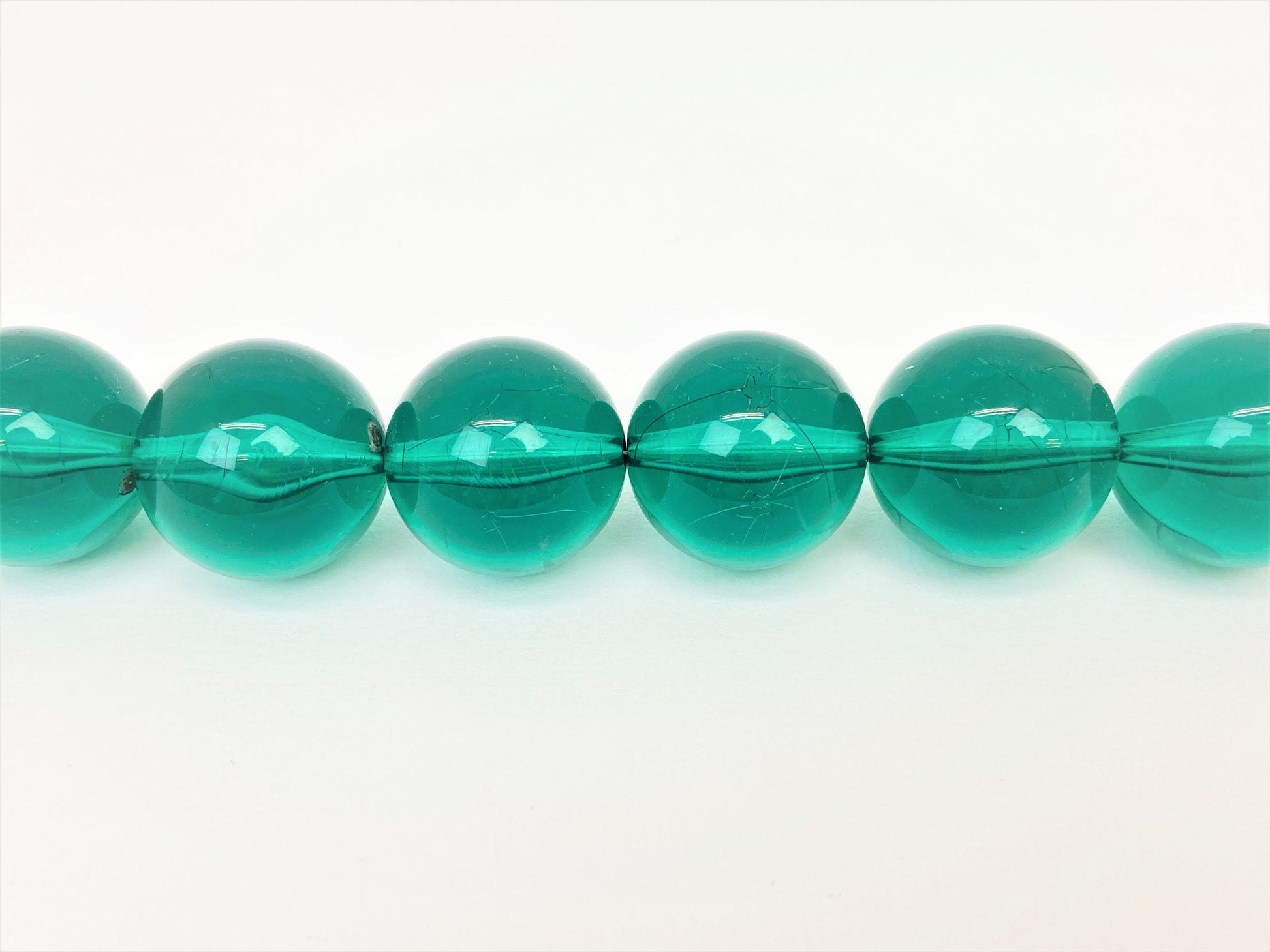 Vardon Enchantment Mixed Bead Necklace by Stage Jewellery with bold round transparent beads in green tones 