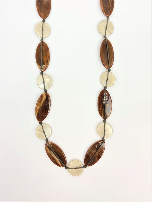 Leda Haze Mixed Bead Necklace by Stage Jewellery in brown and white tones