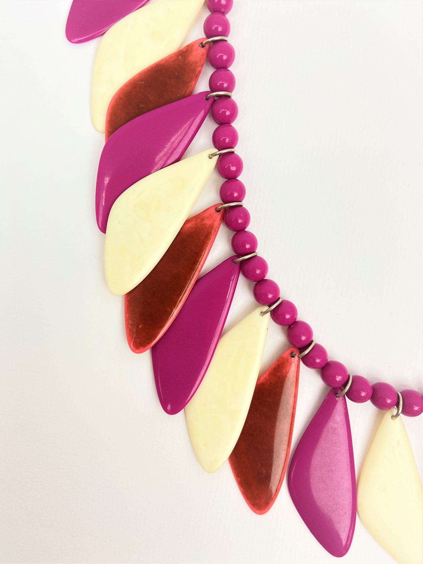 Remex Amaranth Mixed Bead Necklace by Stage Jewellery with magenta ivory tones in feathering fashion style